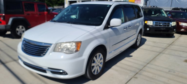 Reliable & Spacious: 2014 Chrysler Town & Country Touring – V6 Power, Family Ready!<br><br><br>Looking for a dependable family van that blends comfort, performance, and practicality? Check out this 2014 Chrysler Town & Country Touring – a well-maintained passenger van with room for everyone and everything.<br><br>🚗 Vehicle Details:<br><br>Make/Model: 2014 Chrysler Town & Country Touringi<br>Engine: 3.6L V6 – strong, smooth, and fuel-efficient<br>Transmission: Automatic<br>Mileage: 85524<br>Color: White                         Status: Clean<br>VIN: 2C4RC1BG0ER463784<br><br> ✅ Features & Highlights:<br><br>Stow ‘n Go® seating – easily fold the second and third rows for extra cargo space<br>Rear DVD entertainment system– perfect for road trips and family rides<br>Leather seats – easy to clean and comfortable<br>Power sliding doors & liftgate – convenience at your fingertips<br>Backup camera – added safety and ease when parking<br>Tri-zone climate control – comfort for everyone onboard<br>Bluetooth & Uconnect® system – stay connected on the go<br><br>🛠️ Maintenance & Condition:<br><br>This van has been well cared for, with regular oil changes and a recent inspection. Mechanically sound and ready for its next adventure – whether that’s carpool duty or a cross-country vacation.<br><br>💰 Price:<br><br>Asking Price– $11950/-serious offers welcome!<br><br>—<br><br>📍 Location: 301 N Newbridge LEVITTOWN<br>📞 Contact: 516 796 0076<br>—<br><br>Why the Town & Country?<br>This model is known for its versatility, durability, and family-friendly features. With a strong V6 engine and Chrysler’s reputation for comfort, it’s a great choice for anyone in need of a spacious and reliable ride.